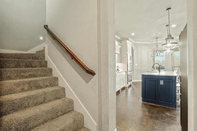 8500 Cobble Stone, Godley, TX 76044 - staircase featuring finished concrete flooring and recessed lighting