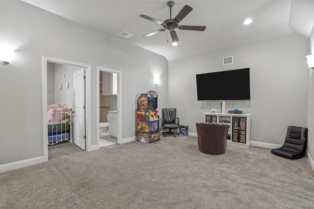 interior space with ceiling fan, carpet flooring, visible vents, and baseboards