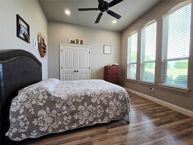 bedroom featuring baseboards, a ceiling fan, recessed lighting, and wood finished floors