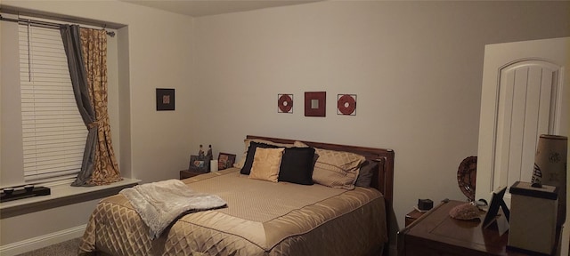 bedroom with baseboards