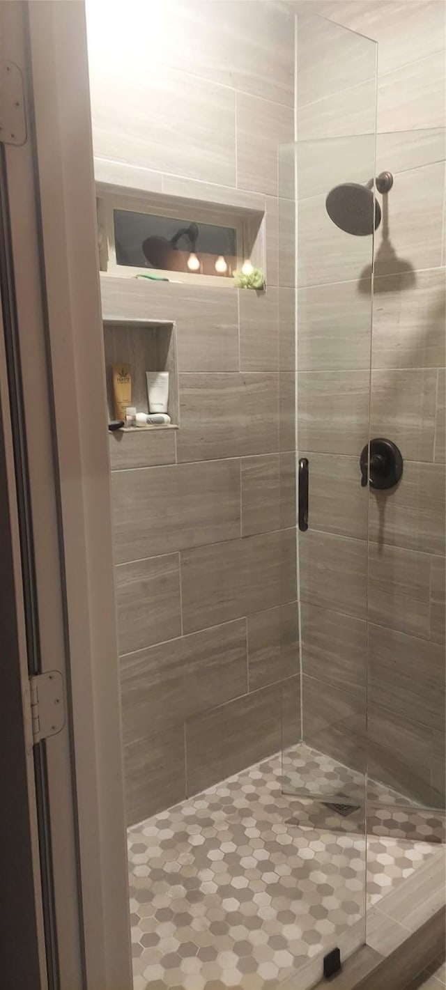 full bath featuring a stall shower