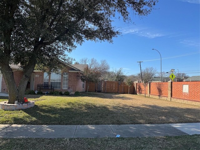 view of yard with fence