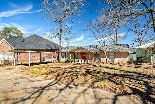 exterior space featuring brick siding