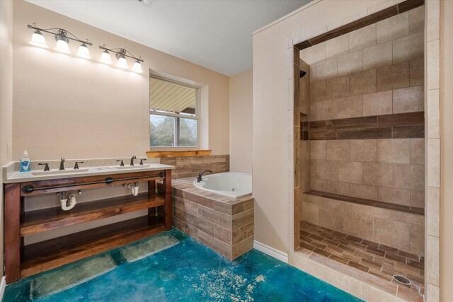 full bathroom with a tub with jets