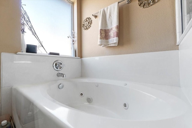 bathroom featuring a whirlpool tub