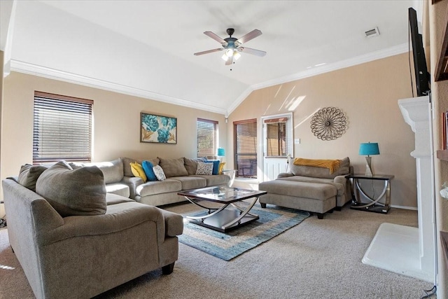 carpeted living area featuring plenty of natural light, visible vents, vaulted ceiling, and crown molding