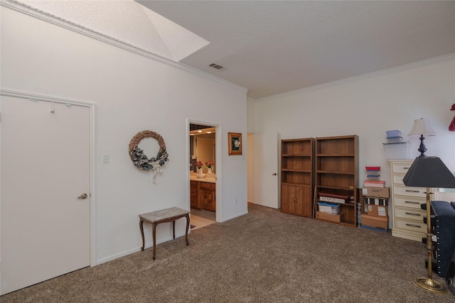 interior space featuring ornamental molding, carpet, visible vents, and a textured ceiling