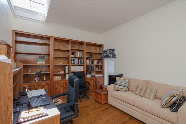 home office with crown molding, a textured ceiling, and wood finished floors