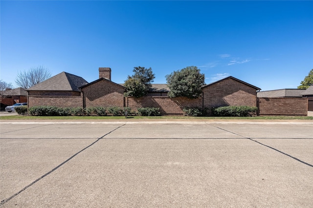 view of street with curbs