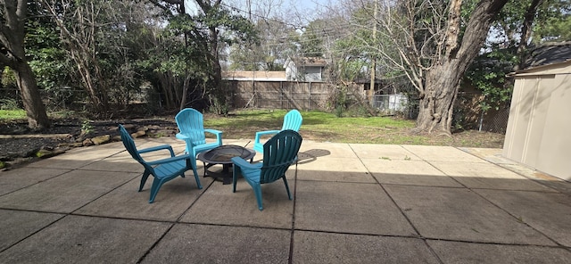 view of patio featuring fence