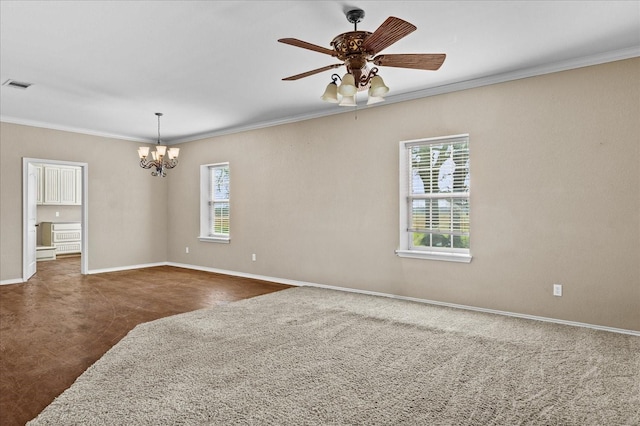 unfurnished room with dark colored carpet, a wealth of natural light, visible vents, and crown molding