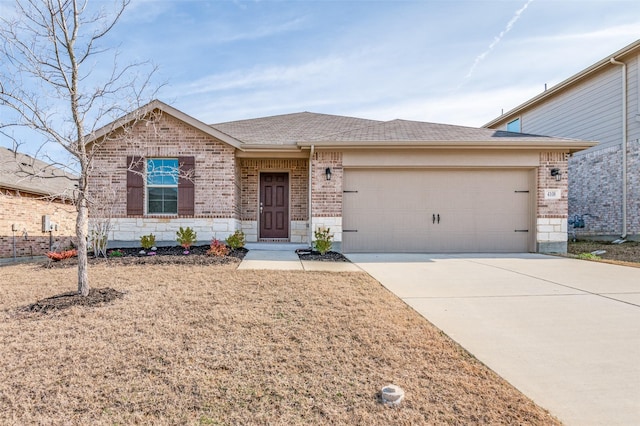 ranch-style home with stone siding, brick siding, driveway, and an attached garage