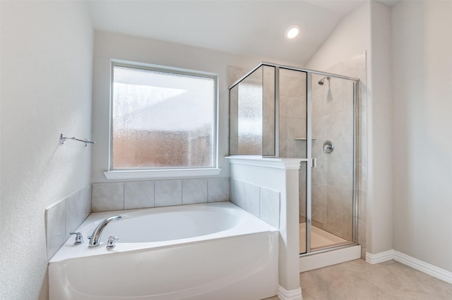 bathroom with a stall shower, baseboards, a garden tub, tile patterned flooring, and recessed lighting