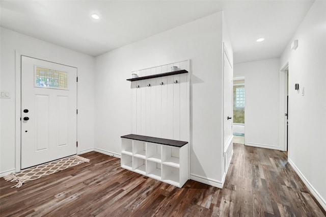 mudroom featuring baseboards, dark wood-type flooring, and recessed lighting