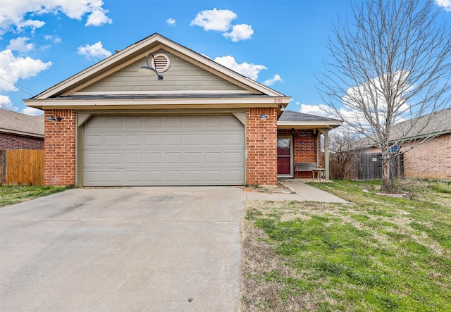 ranch-style home featuring driveway, brick siding, and fence