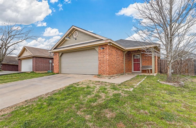 ranch-style house featuring a front yard, concrete driveway, brick siding, and an attached garage