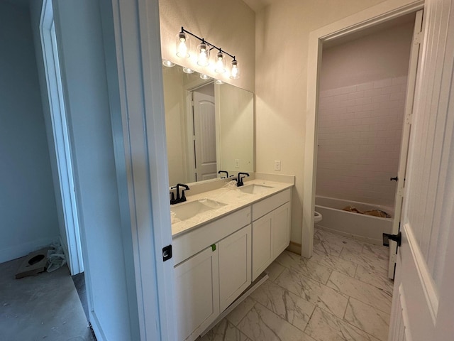 1045 Woodland Rd, Weatherford, TX 76088 - bathroom featuring double vanity, toilet, marble look tile flooring, and shower / bathtub combination