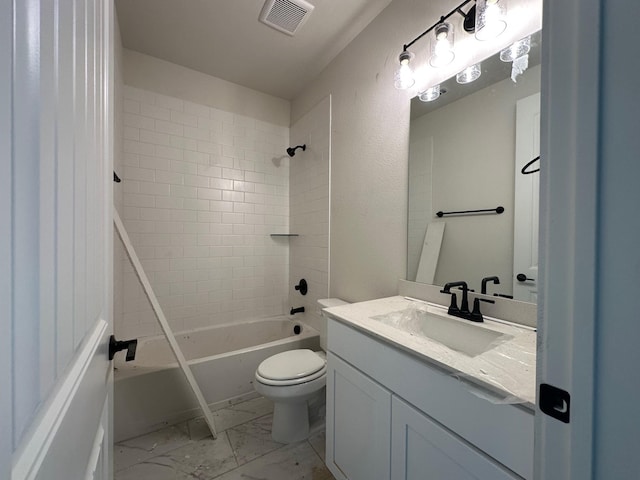 1045 Woodland Rd, Weatherford, TX 76088 - bathroom featuring vanity, marble look tile flooring, toilet, and bathing tub / shower combination