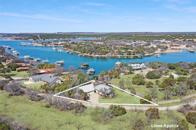 birds eye view of property featuring a water view