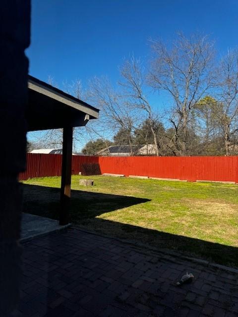 view of yard featuring fence