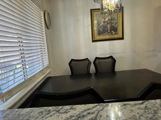 dining room with an inviting chandelier