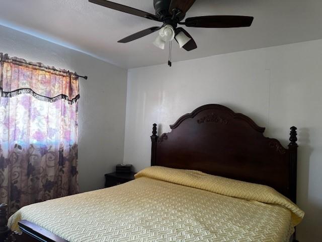 bedroom featuring a ceiling fan