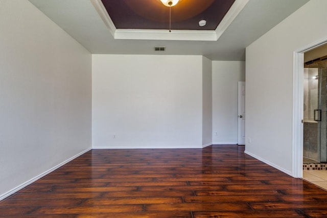8860 Noontide Dr, Fort Worth, TX 76179 - unfurnished room featuring a raised ceiling, wood finished floors, and ornamental molding