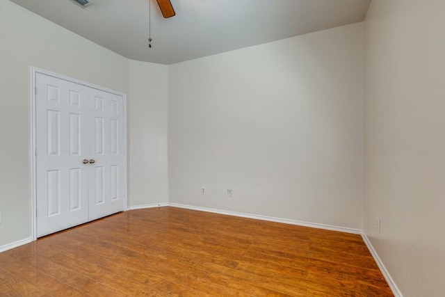 8860 Noontide Dr, Fort Worth, TX 76179 - unfurnished bedroom with light wood-style flooring and a ceiling fan