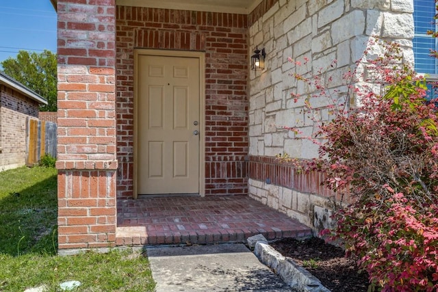 8860 Noontide Dr, Fort Worth, TX 76179 - view of exterior entry featuring brick siding