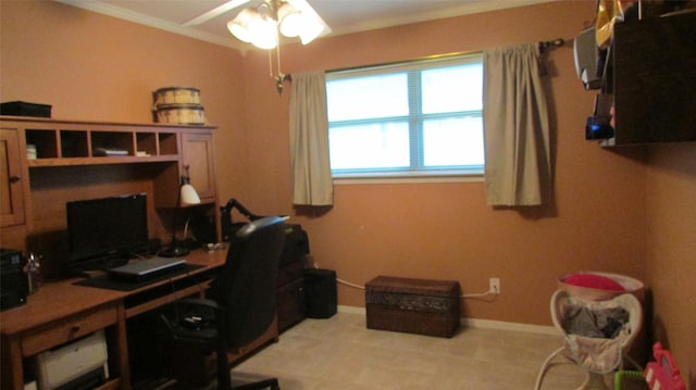 office space with baseboards, a ceiling fan, and ornamental molding