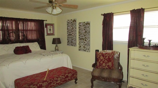 bedroom with ornamental molding and ceiling fan