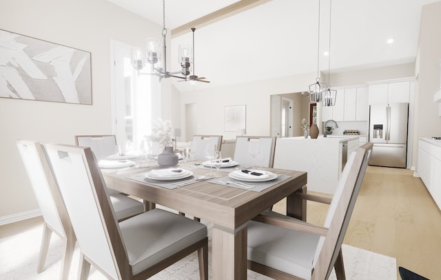 dining room with light wood finished floors and ceiling fan with notable chandelier