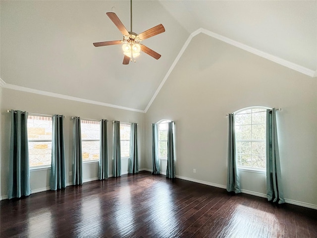 spare room with high vaulted ceiling, dark wood-style flooring, a ceiling fan, baseboards, and crown molding