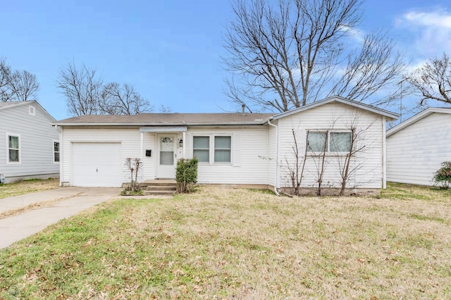 single story home featuring a garage, driveway, and a front yard