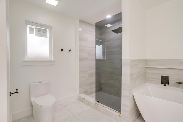 full bathroom with marble finish floor, baseboards, a soaking tub, and toilet