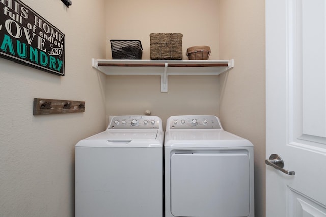 laundry area featuring laundry area and washing machine and dryer