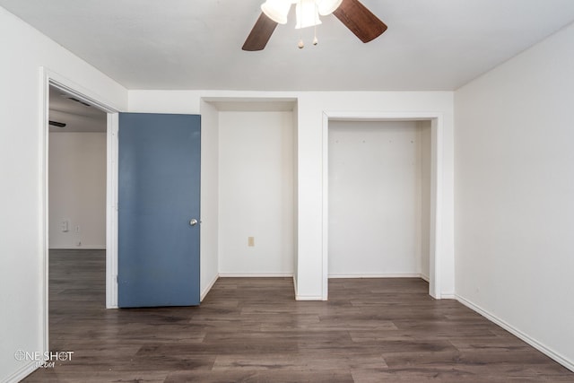 unfurnished bedroom featuring baseboards, a ceiling fan, and dark wood-type flooring