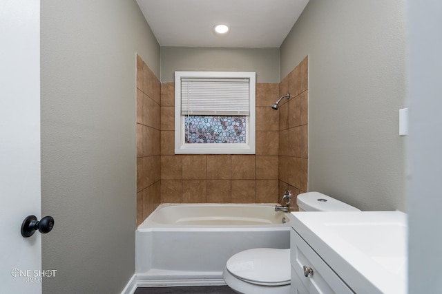 full bathroom featuring  shower combination, vanity, and toilet