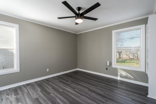 unfurnished room with crown molding, dark wood-style flooring, a ceiling fan, and baseboards