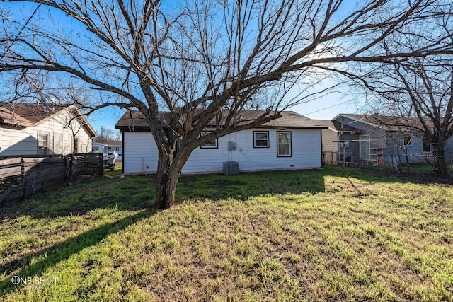 exterior space with a yard and fence