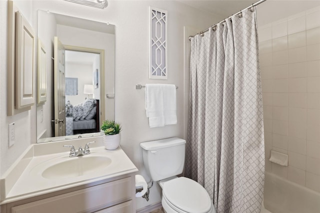 full bathroom with vanity and toilet