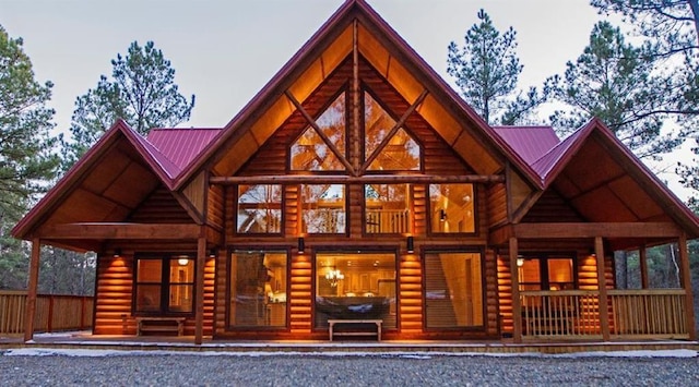 rear view of house with metal roof