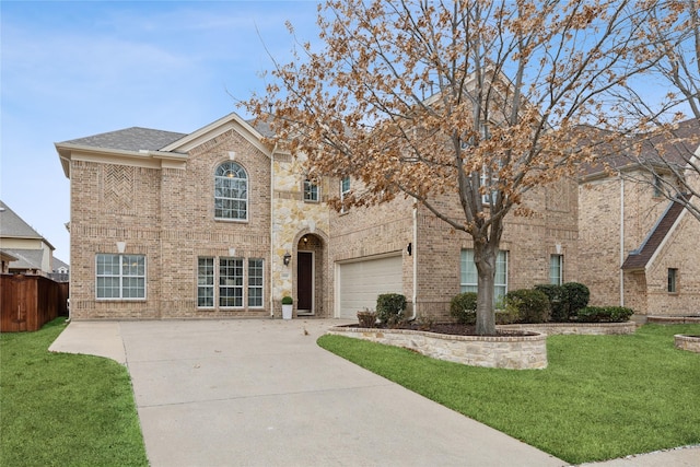 view of front facade with a garage, a front lawn, concrete driveway, and brick siding