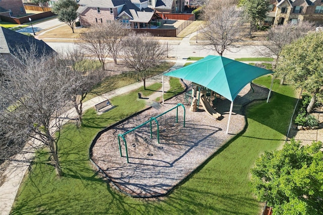 view of community featuring playground community and a residential view