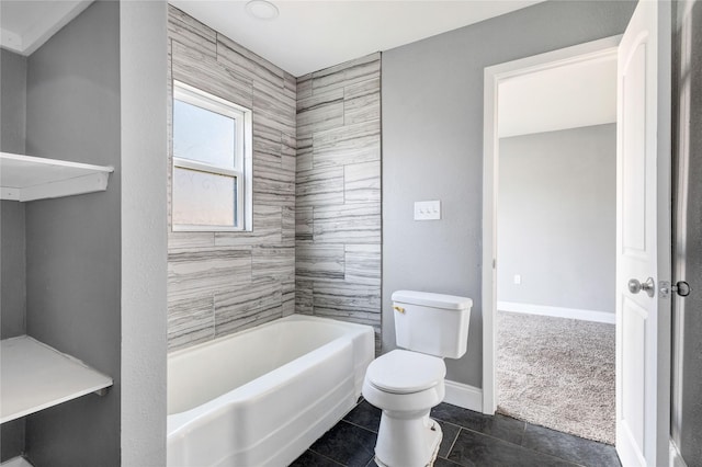 full bath with tile patterned flooring, toilet, and baseboards