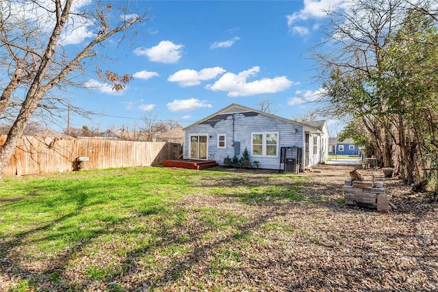 exterior space featuring a yard and fence