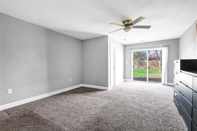 unfurnished living room featuring ceiling fan, baseboards, and carpet flooring