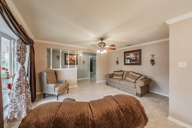 living room featuring a textured ceiling, a ceiling fan, baseboards, visible vents, and crown molding