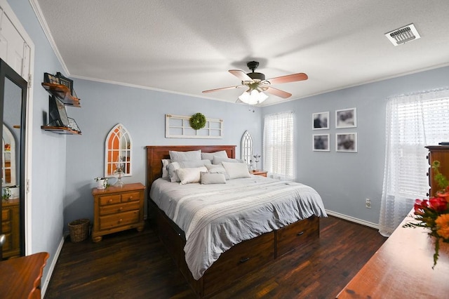 bedroom featuring crown molding, multiple windows, visible vents, and dark wood-type flooring