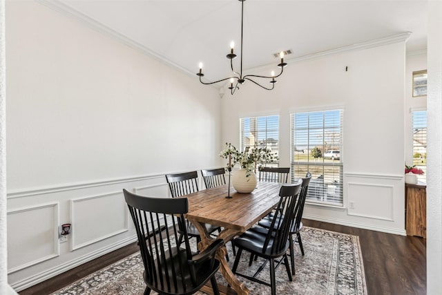 dining space with an inviting chandelier, visible vents, dark wood-style flooring, and a wealth of natural light